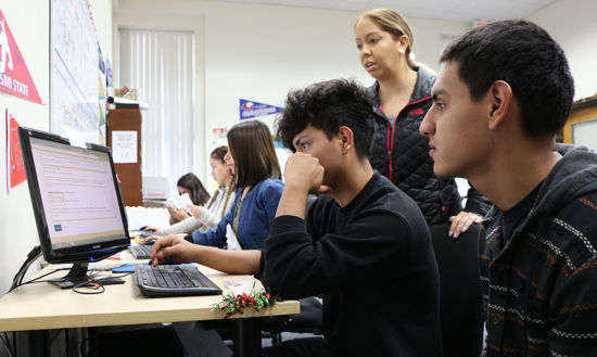Staff help students file transfer applications